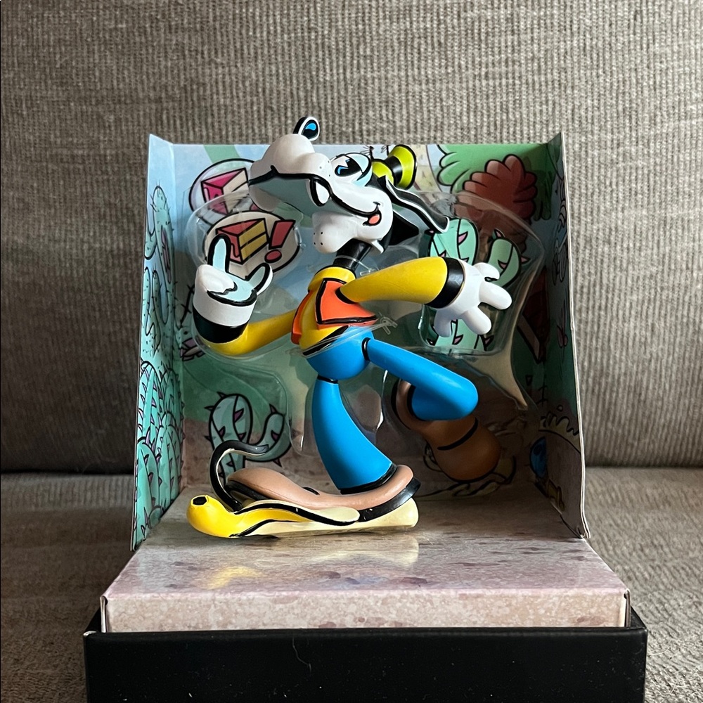 Animated Adventure Action Figure with Blue and Yellow Accents